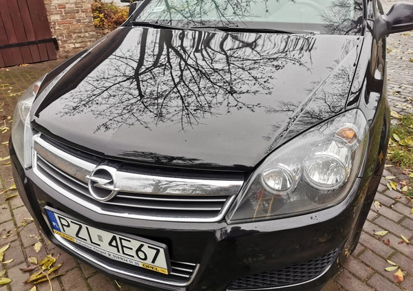 Opel Astra cena 17500 przebieg: 243080, rok produkcji 2011 z Ostróda małe 704
